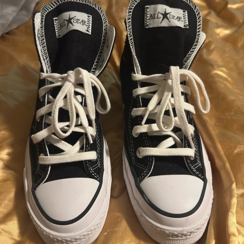Converse Black and White High-Tops with Signature Detail